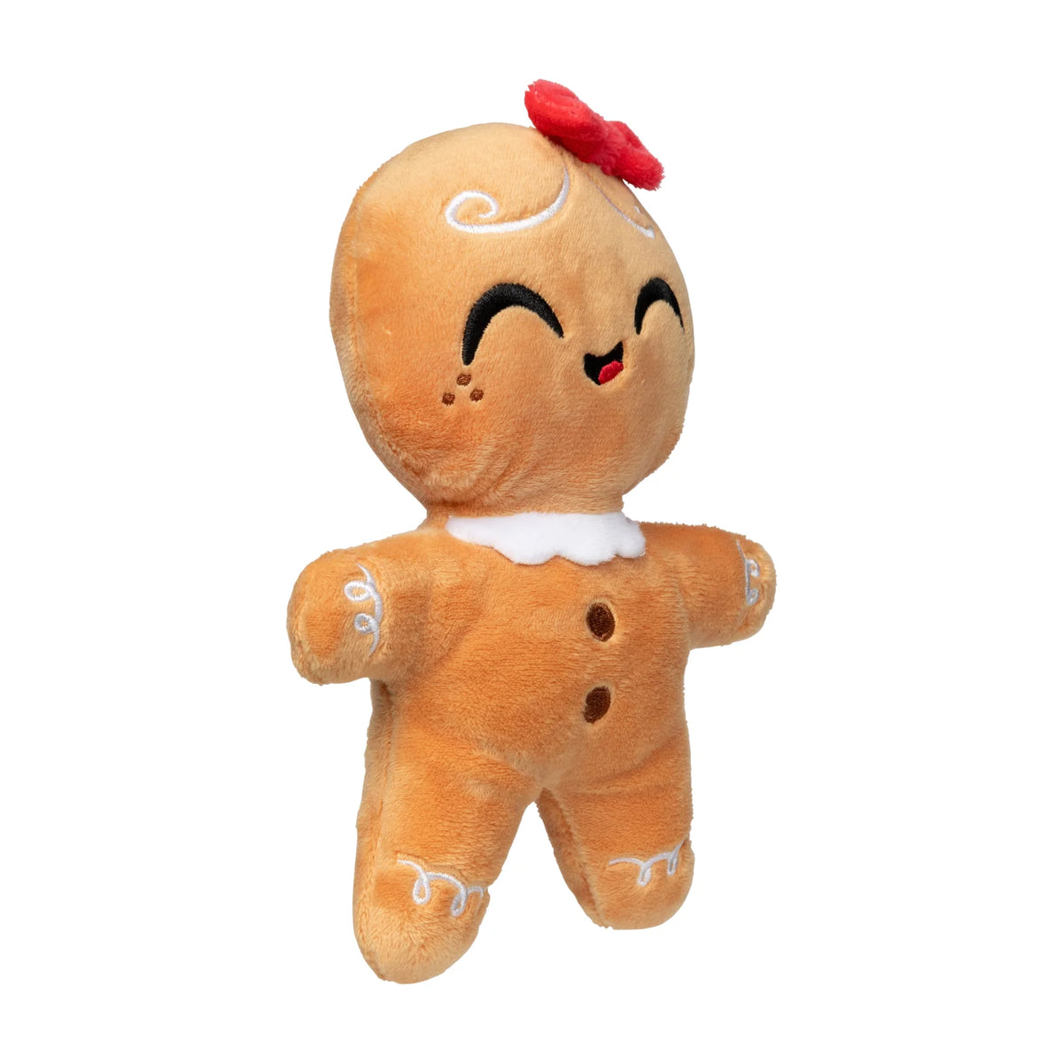 A plush FuzzYard Doughlilia gingerbread Christmas dog toy with a warm orange-brown body, white icing details, a red bow on its head, and embroidered facial features, shown against a plain white background.