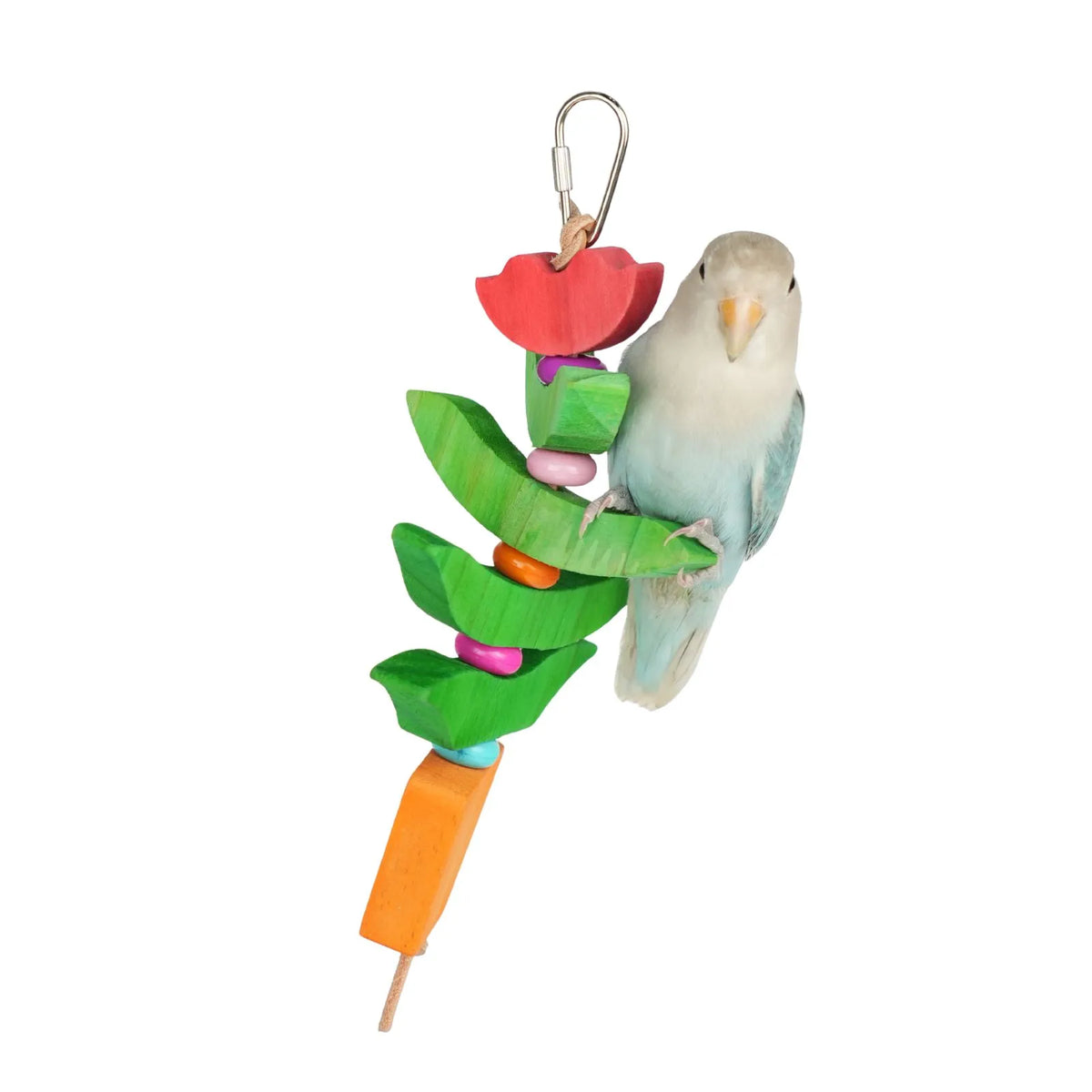 A wooden bird toy with colorful carved branches, a red flower, and a metal clip, shown with a small light blue and white bird perched on it against a plain white background.