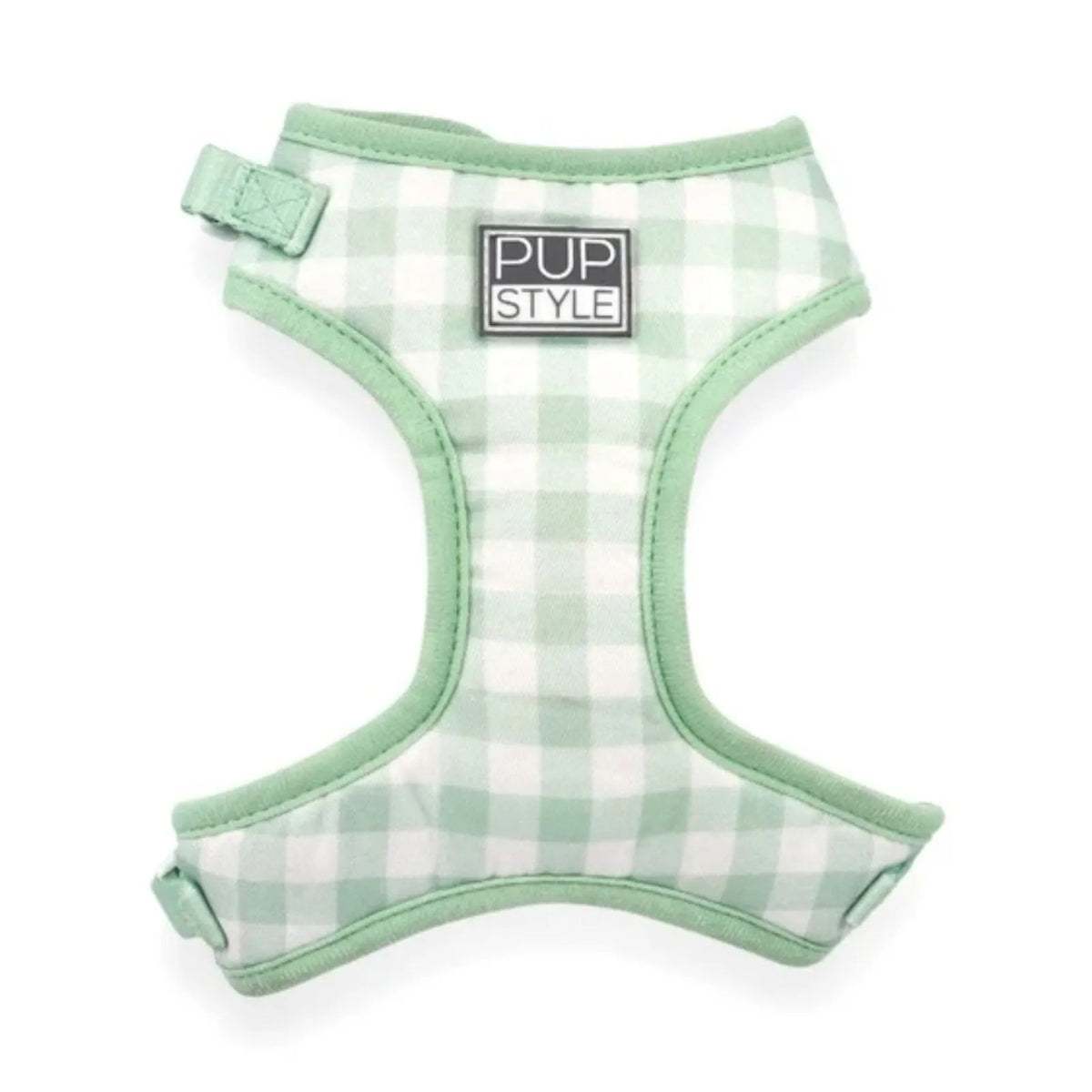 A green and white gingham check dog harness with mint green trim and a central black and white 'PUP STYLE' brand patch, shown on a plain white background.