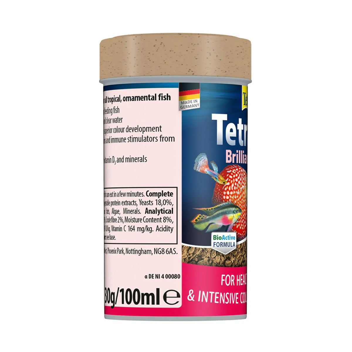 A cylindrical plastic bottle of Tetra Brilliant live fish food, featuring a light brown speckled lid, a pink and white label, and a dark blue front panel with images of colorful tetras and gravel.