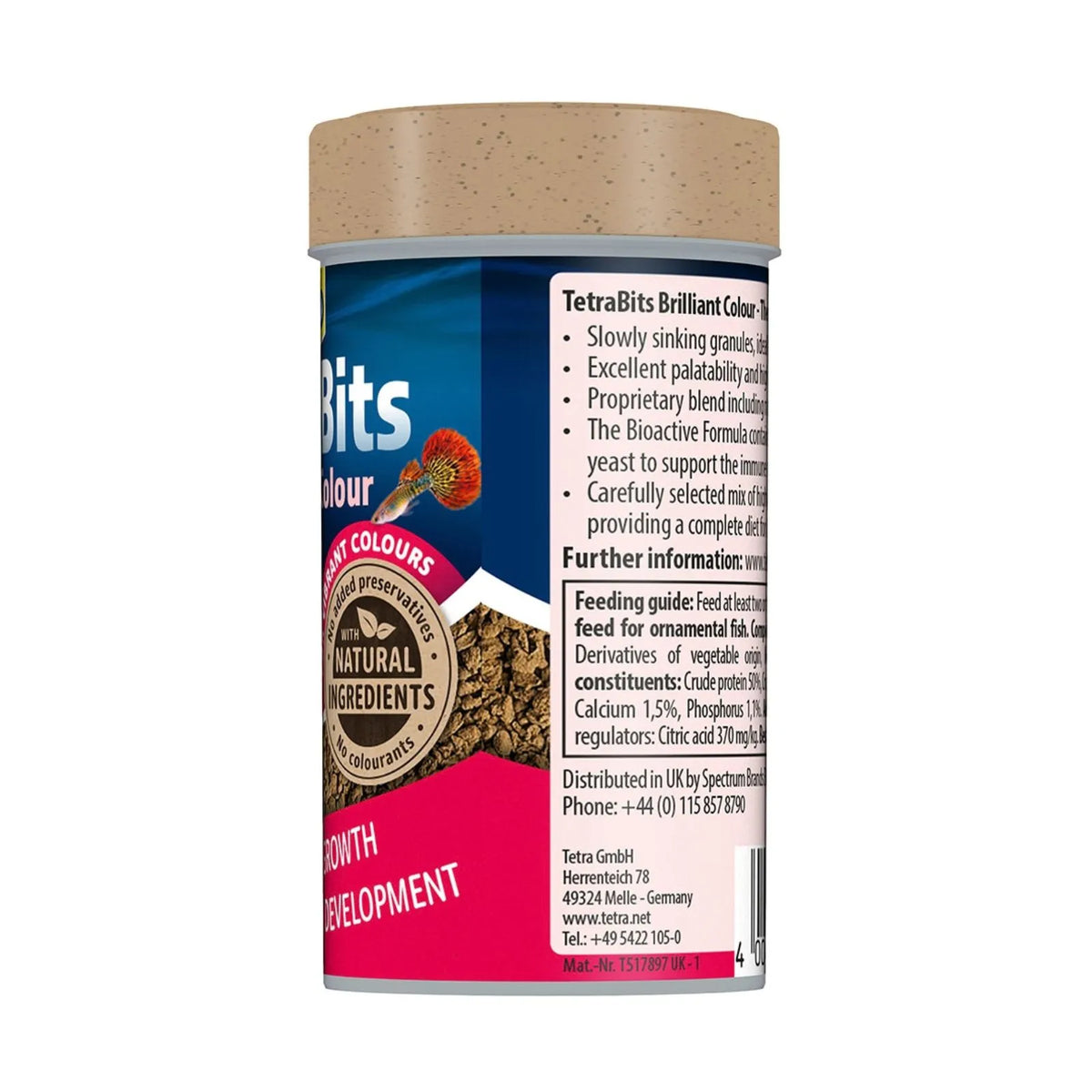 A cylindrical TetraBits fish food container shown from the side, displaying the blue and pink label with product details, a beige lid, and a clear plastic top.