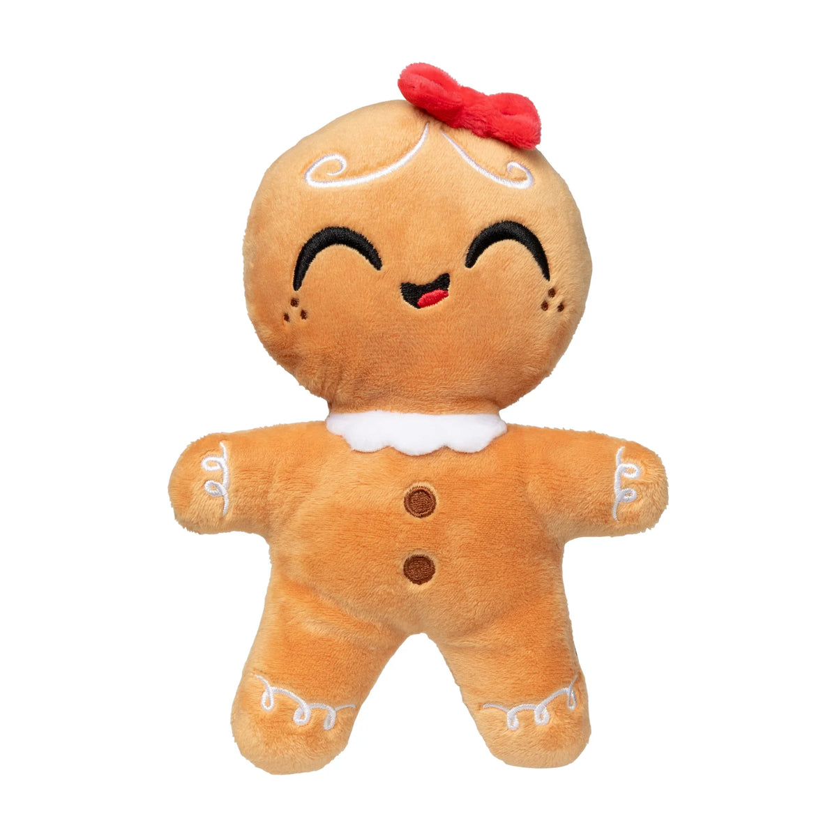 A plush FuzzYard Doughlilia gingerbread Christmas dog toy with a warm tan body, white icing details, brown buttons, a red bow on its head, and a smiling face, isolated on a white background.