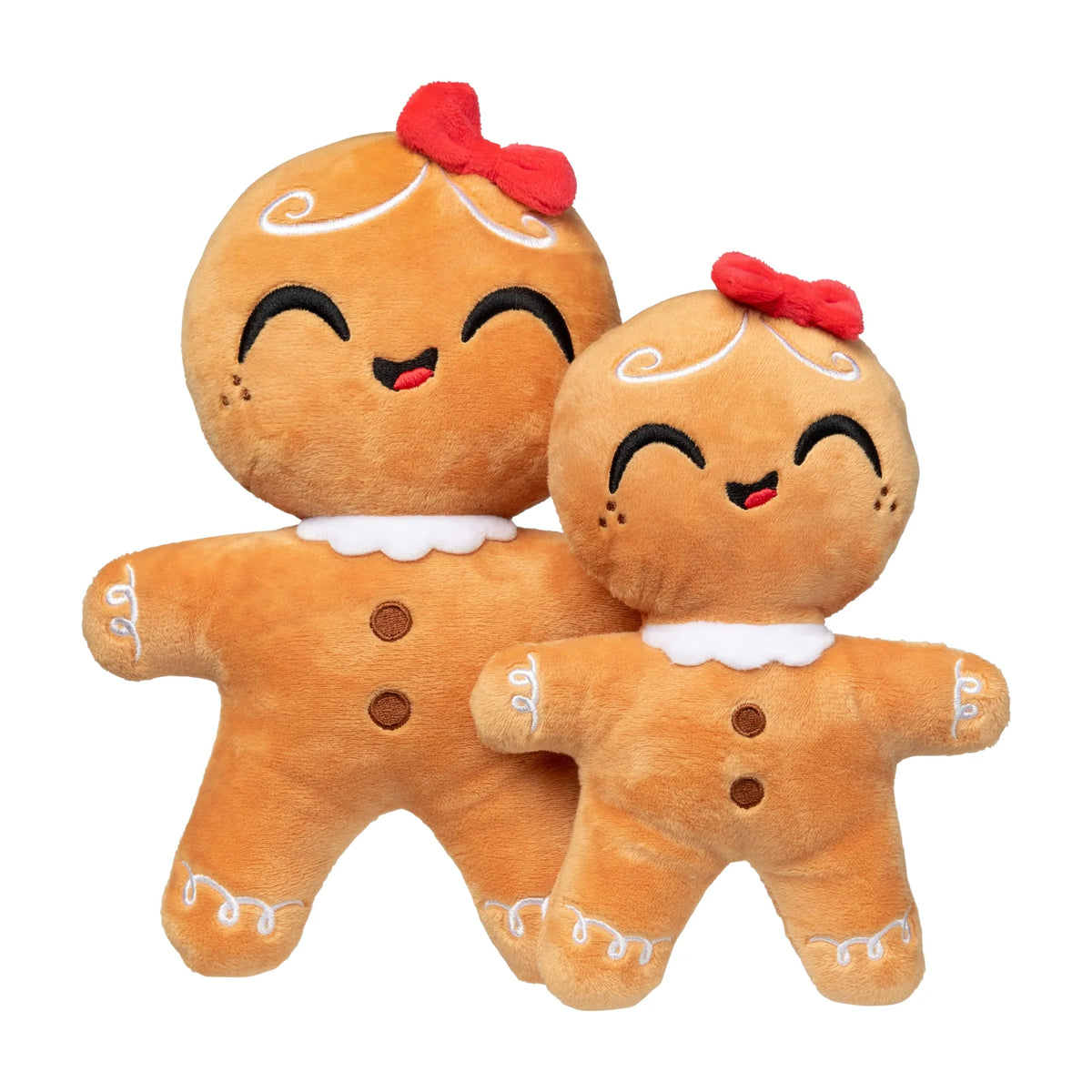 Two gingerbread person plush toys in different sizes, standing side by side against a plain white background. The larger plush has a red bow on its head, and the smaller plush also has a red bow.