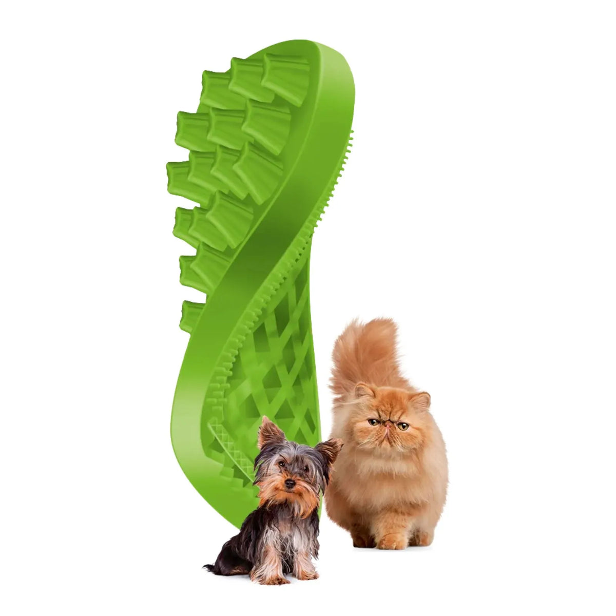 A bright green Pet & Me silicone dog grooming brush shaped like a shoe sole, shown on a white background with a small dark dog and a fluffy orange cat beside it.