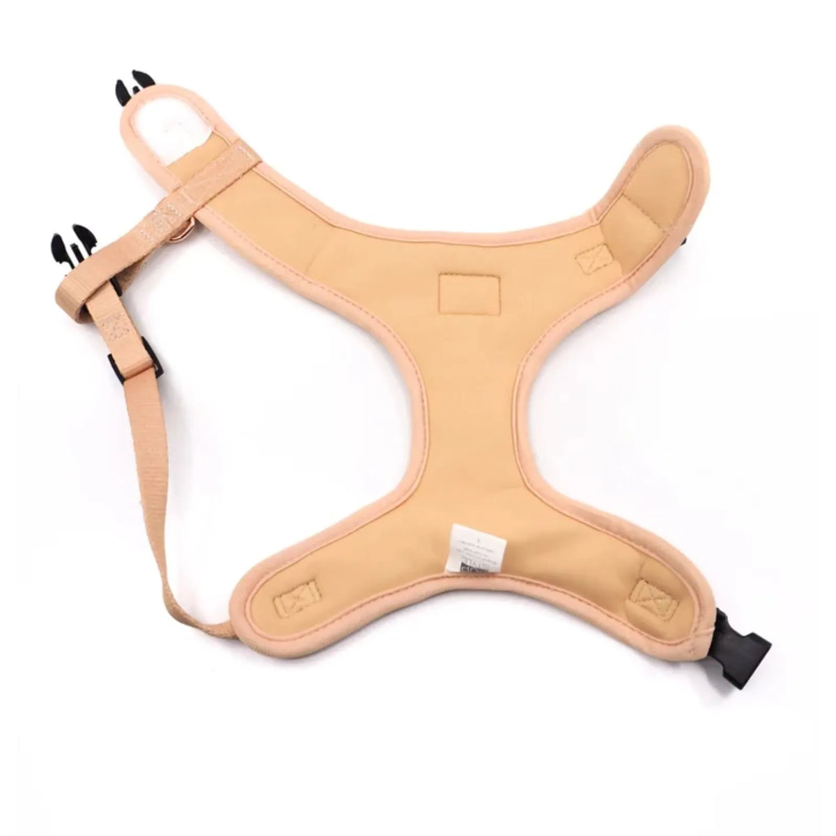A tan padded pet harness with black paw-print accents on the collar and a black plastic release buckle, shown flat on a white background.