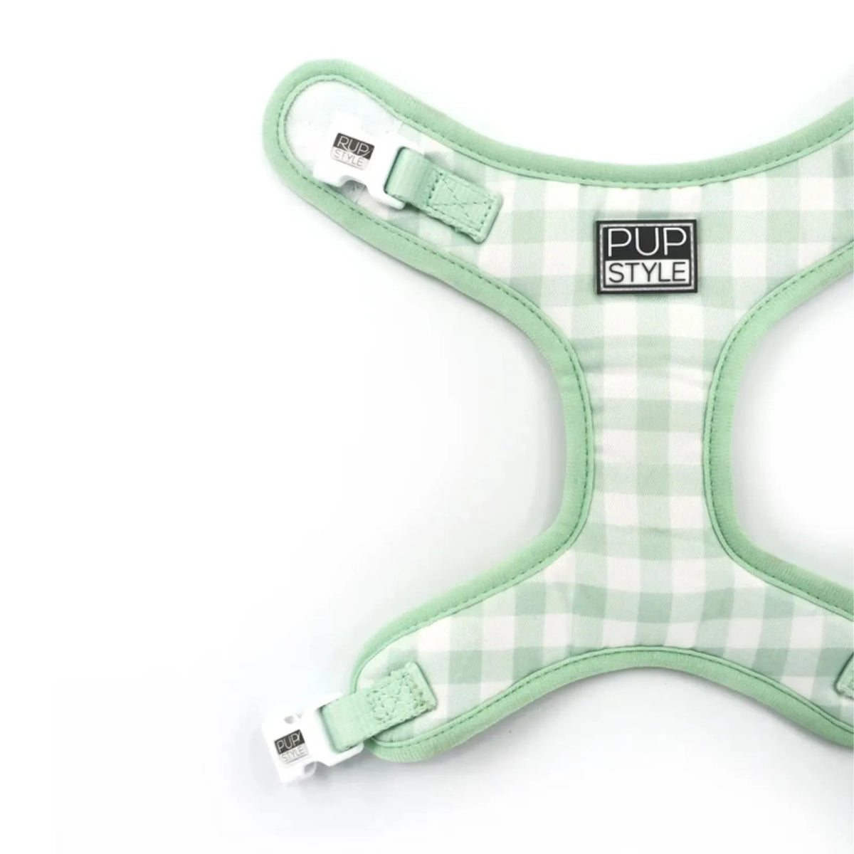 A mint green and white gingham check harness with a black and white 'PUP STYLE' brand patch on the chest, shown on a clean white background.