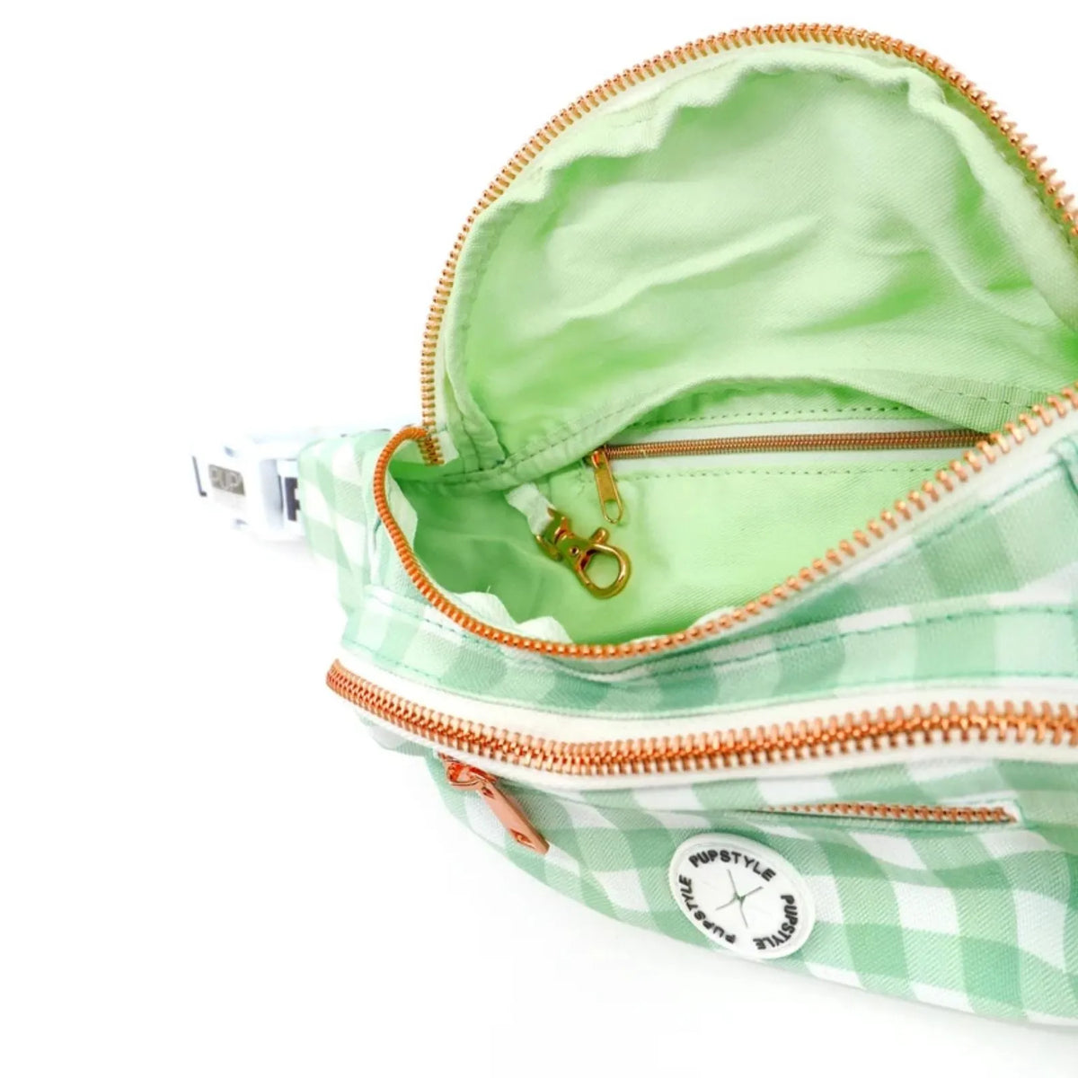 A close-up Pupstyle Sweet Apple Dog Parent Bum Bag with a light green interior, gold-toned zippers.